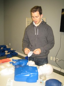 Using an AED during CPR - training course